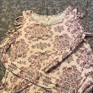 Open shoulder shirt. Barley worn